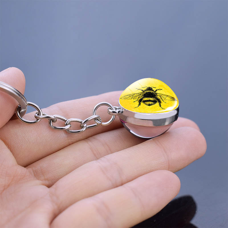 Porte-clés boule en plastique transparent - 7 modèles d'abeilles !