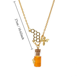 dimensions Collier pendentif pot de miel et breloques