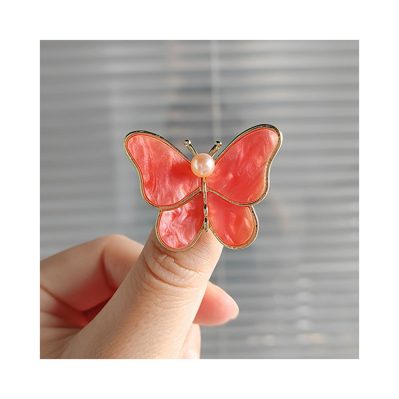 Petite Broche Papillon en Résine avec Perle au Design stylé Couleur Orange