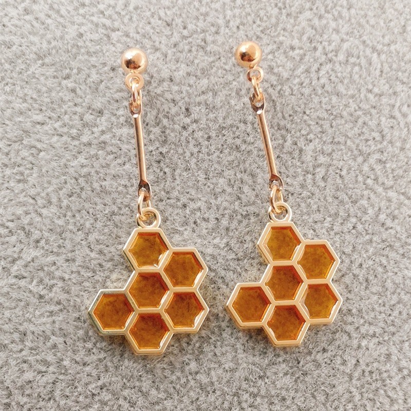 Boucles d'oreilles nid d'abeille hexagonal en émail - jaune